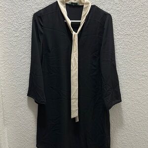 Elegant Black Dress with Cream Accents